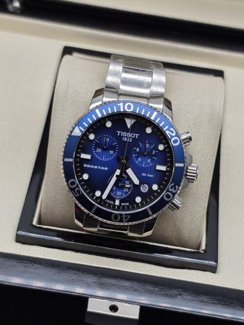 Tissot — esfera azul con subesferas y brazalete plateado
