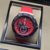 TAG Heuer — esfera roja con subesferas y correa roja