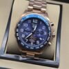 TAG Heuer — esfera azul con números blancos y brazalete rosado