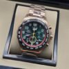 TAG Heuer — esfera verde con aro rojo y brazalete rosado