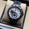 TAG Heuer — esfera blanca con subesferas y correa negra