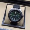 TAG Heuer — esfera verde con bisel negro y correa negra