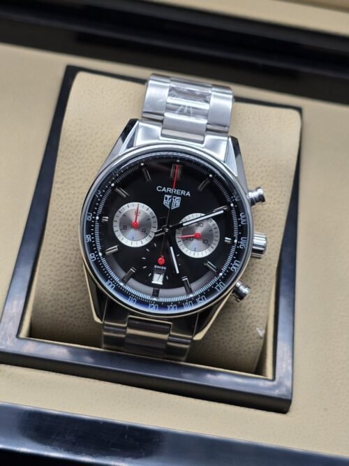 TAG Heuer — esfera negra con subesferas plateadas y brazalete plateado