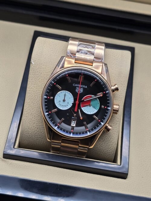 TAG Heuer — esfera negra con subesferas claras y brazalete rosado