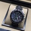 TAG Heuer — esfera negra con subesferas y correa negra