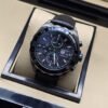 TAG Heuer — esfera negra con subesferas y caja negra