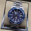 TAG Heuer — esfera azul texturizada y brazalete plateado