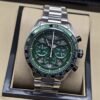 TAG Heuer — esfera verde con subesferas y brazalete plateado
