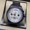 TAG Heuer — esfera blanca con subesferas y brazalete negro