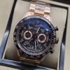 TAG Heuer — esfera abierta oscura y brazalete rosado