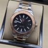 TAG Heuer — esfera negra con bisel rosado y brazalete bicolor