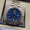 TAG Heuer — esfera azul sencilla y brazalete bicolor