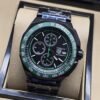 TAG Heuer — esfera negra con bisel verde y brazalete negro