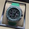 TAG Heuer — esfera negra con bisel verde y correa verde