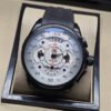 TAG Heuer — esfera blanca con subesferas y correa negra