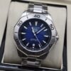 TAG Heuer — esfera azul sencilla con bisel plateado