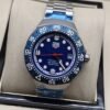 TAG Heuer — esfera azul con aro blanco y brazalete plateado