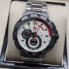 TAG Heuer — esfera blanca con subesferas y bisel negro