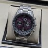 TAG Heuer — esfera violeta con subesferas y brazalete plateado