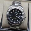 TAG Heuer — esfera negra texturizada con bisel plateado