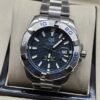 TAG Heuer — esfera verde texturizada con bisel plateado