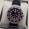 TAG Heuer — esfera negra con aro rojo y correa negra