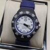 TAG Heuer — esfera blanca con aro azul y correa azul