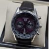 TAG Heuer — esfera violeta con subesferas y correa negra