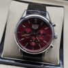 TAG Heuer — esfera roja con subesferas y correa negra