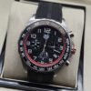 TAG Heuer — esfera negra con aro rojo y correa negra