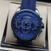 TAG Heuer — esfera azul con subesferas y correa azul