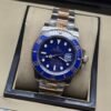 Rolex — esfera y bisel azules con brazalete bicolor