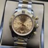 Rolex — esfera dorada con subesferas y brazalete bicolor