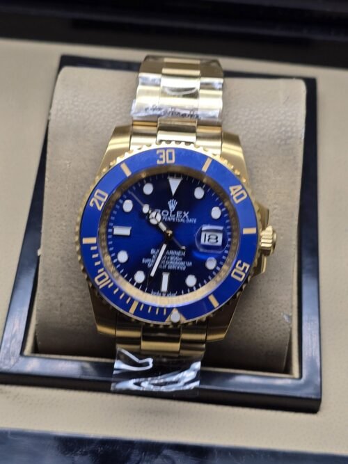 Rolex — esfera y bisel azules con brazalete bicolor