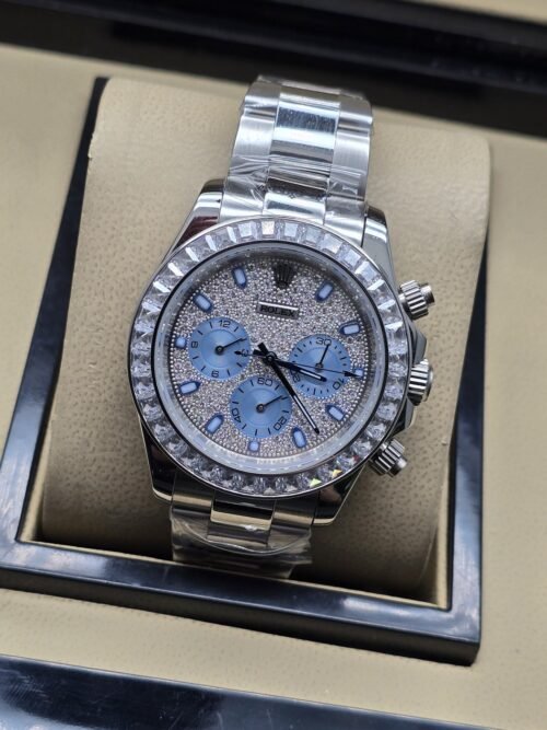 Rolex — esfera azul clara brillante con bisel y brazalete plateados