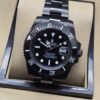 Rolex — esfera y bisel negros con brazalete oscuro