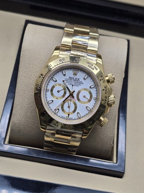 Rolex — esfera blanca con subesferas doradas y brazalete dorado