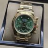 Rolex — esfera verde con subesferas y brazalete dorado