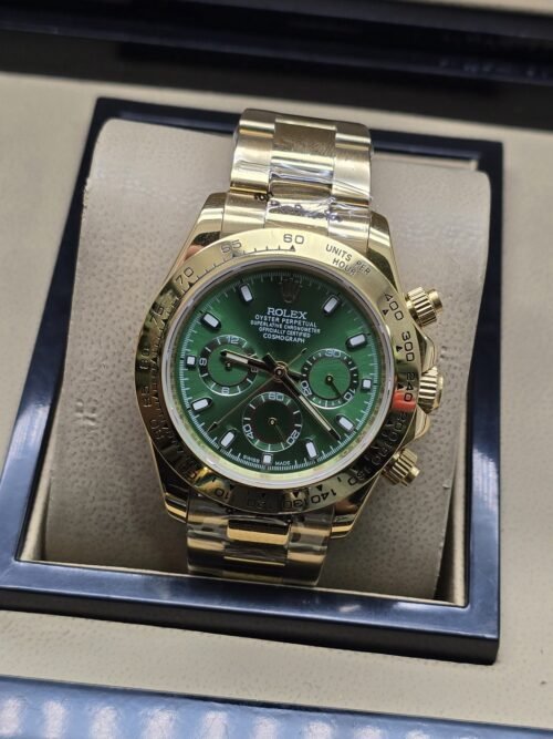 Rolex — esfera verde con subesferas y brazalete dorado