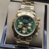 Rolex — esfera verde con subesferas doradas y brazalete dorado