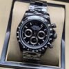 Rolex — esfera negra con subesferas claras y brazalete plateado