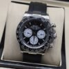 Rolex — esfera negra con tres subesferas blancas y correa negra