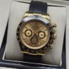 Rolex — esfera dorada con subesferas y correa negra