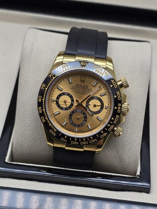 Rolex — esfera dorada con subesferas y correa negra