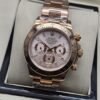 Rolex — esfera clara con subesferas y brazalete rosado