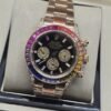 Rolex — esfera negra con subesferas doradas y bisel multicolor