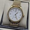 Rolex — esfera blanca con subesfera inferior y brazalete dorado
