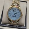 Rolex — esfera azul con subesfera inferior y brazalete dorado
