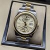 Rolex — esfera dorada texturizada con bisel dorado y brazalete bicolor · 41 mm