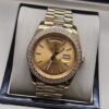 Rolex — esfera dorada con bisel brillante y brazalete dorado · 41 mm